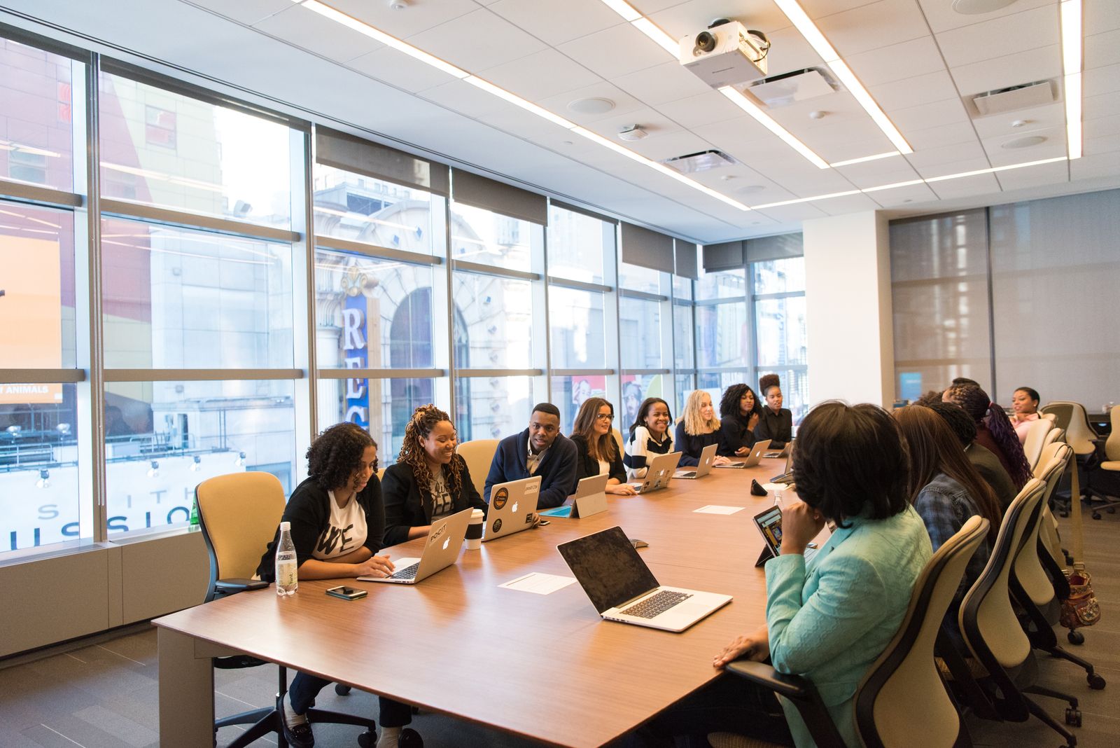 Executives gathered around a boardroom table